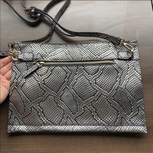 Silver Snake skin crossbody purse orange interior